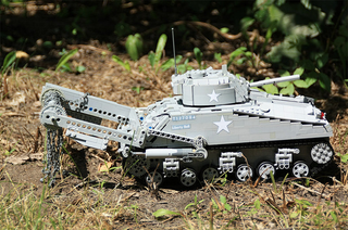 Illustration for article titled Fully Motorized LEGO Tank Has A Cool Mine Flail